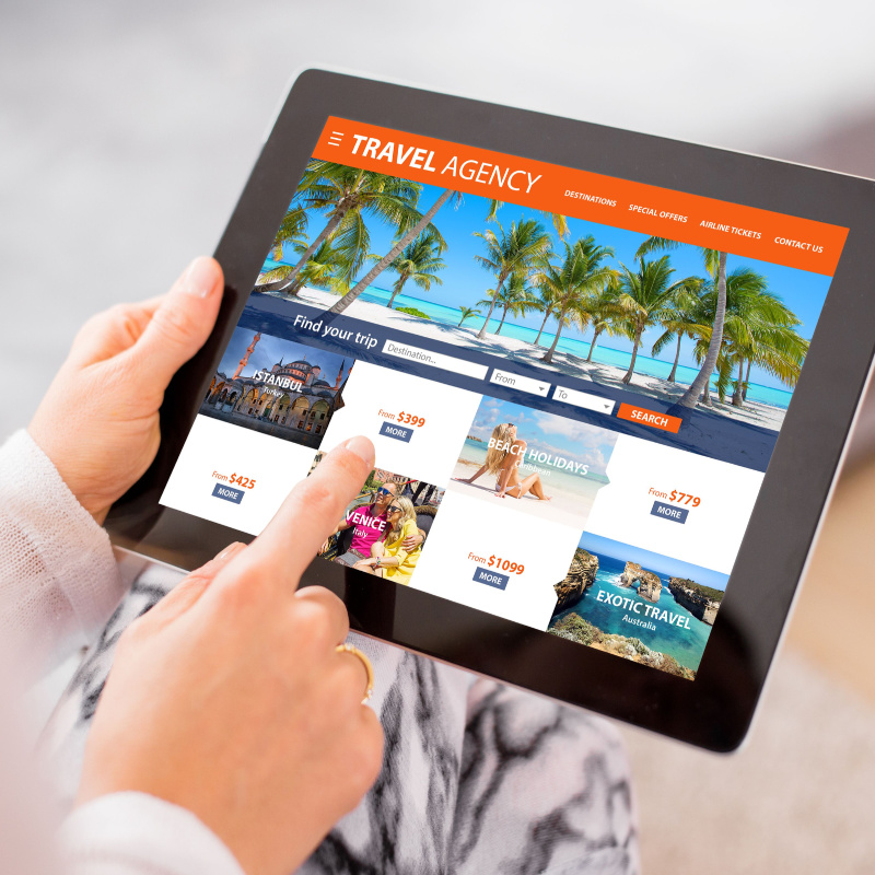 Traveler Booking a Beach Vacation Online