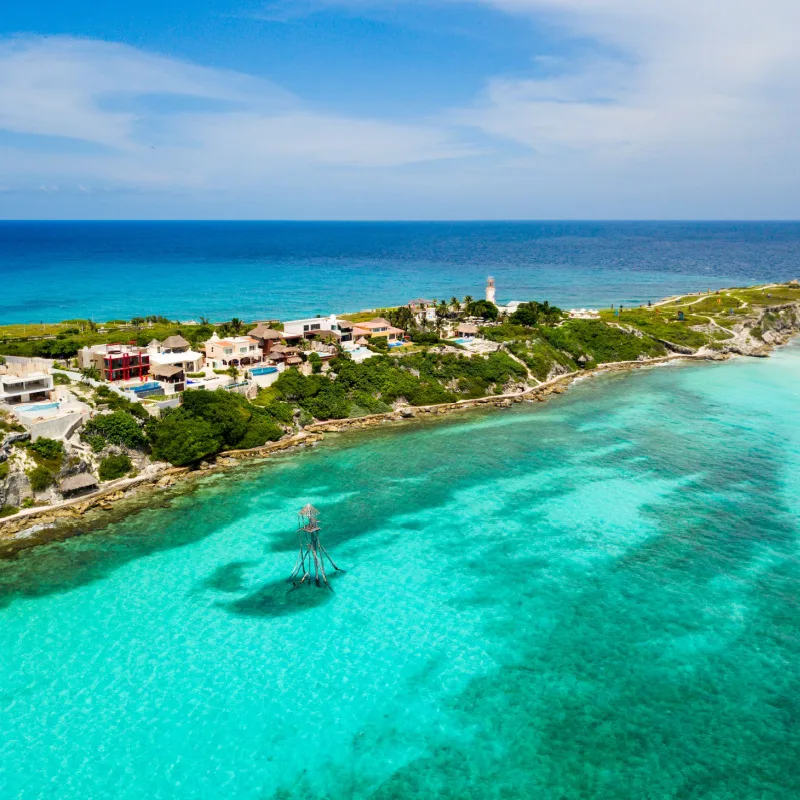 Playa Mujeres and the gorgeous Caribbean Sea near Cancun Mexico.