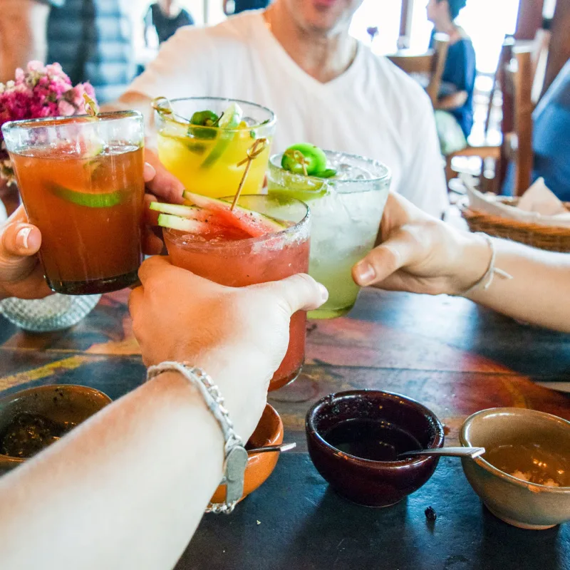 Colourful Mexican drinks with friends 
