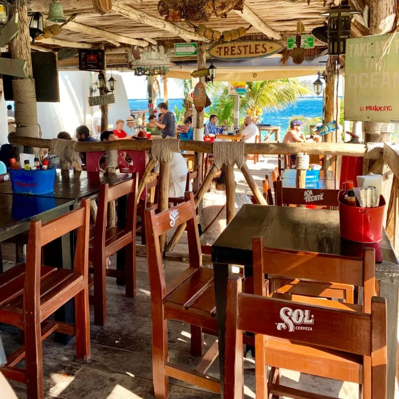 Puerto Morelos Beachfront Restaurant with People Sitting at the Bar