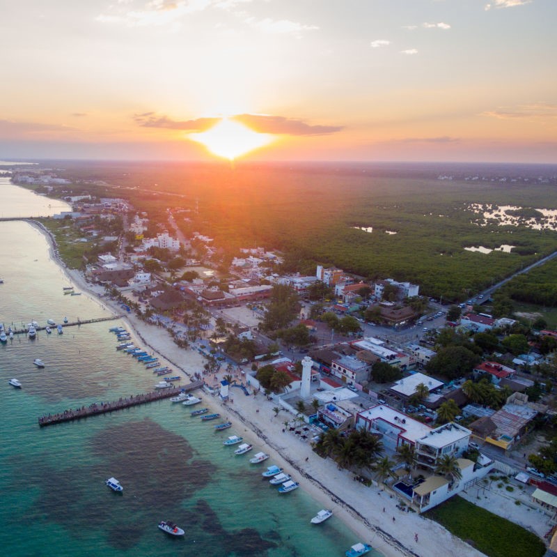 Puerto Morelos Aerial View of beaches and buildings.