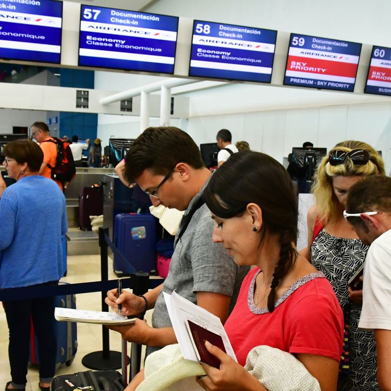 tourists at cancun airport