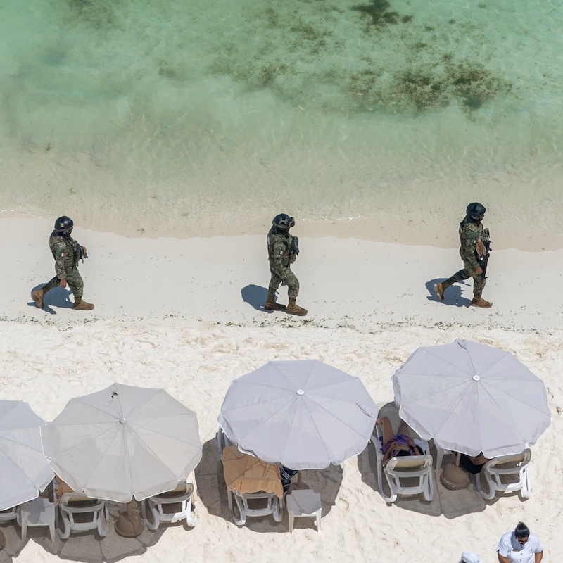 Police sea beach military, cancun