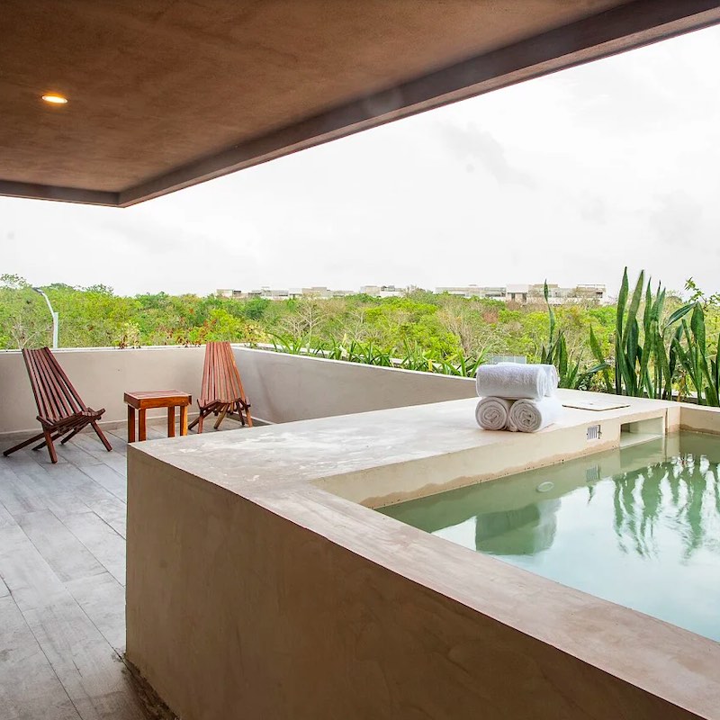 patio and pool of Selina private plus suite in downtown Tulum