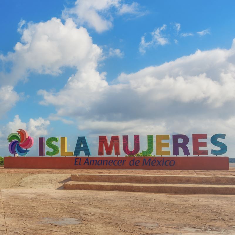 colorful sign for tourists in Isla Mujeres