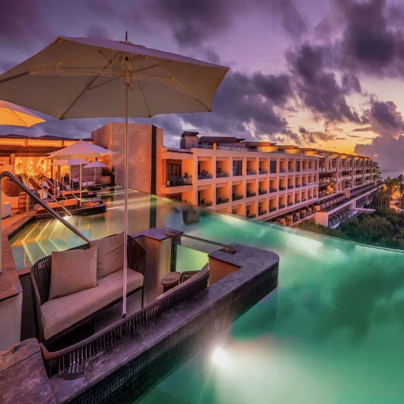 Pool at Night at Atelier Playa Mujeres