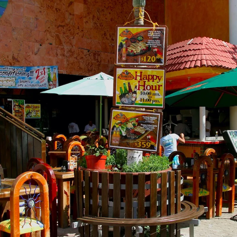 outdoor restaurant with Happy Hour menu in Playa del Carmen