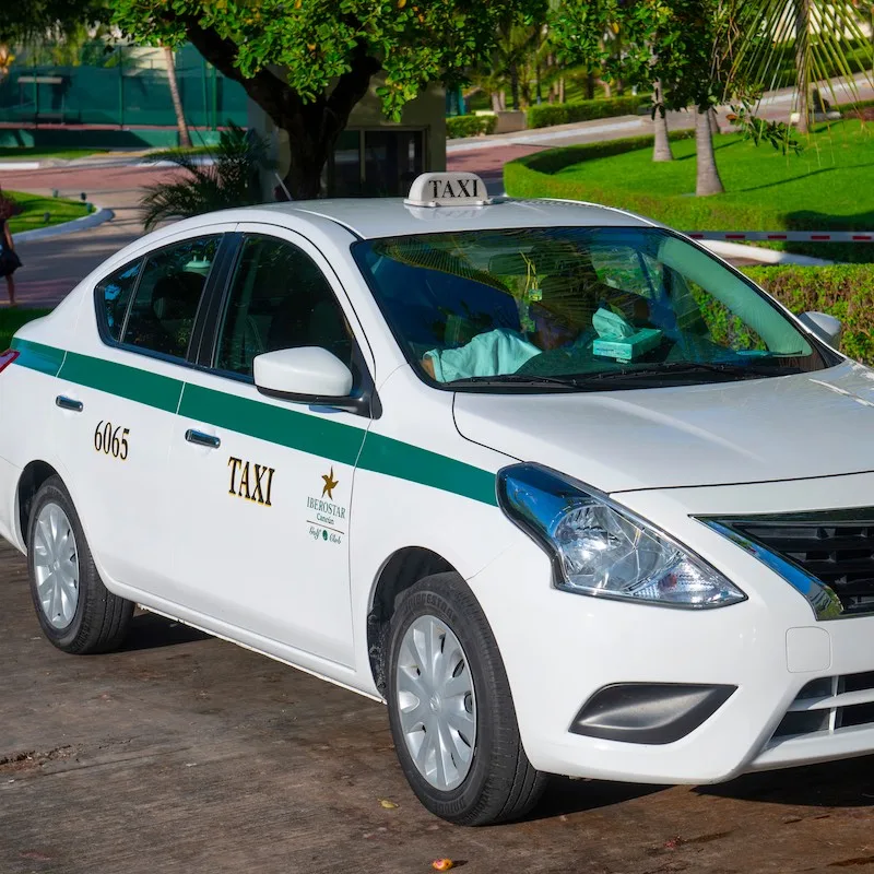 CANCUN, MEXICO - JAN. 22, 2020: Cancun Iberostar Taxi at hotel in Hotel Zone, Cancun.