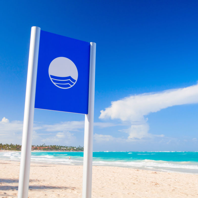 Blue flag sign in Cancun beach