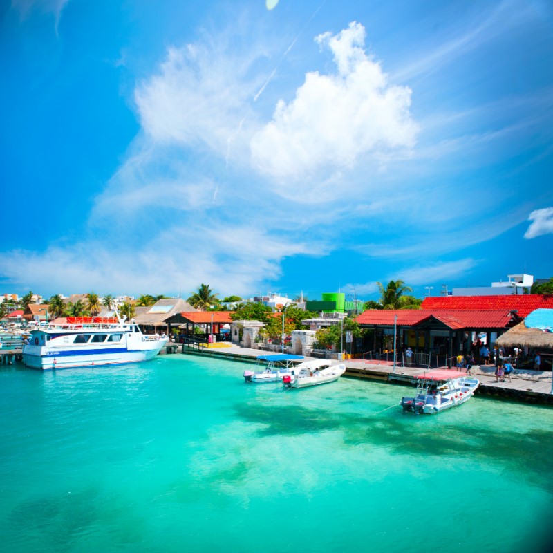 Isla Mujeres Boats in dock on a sunny day