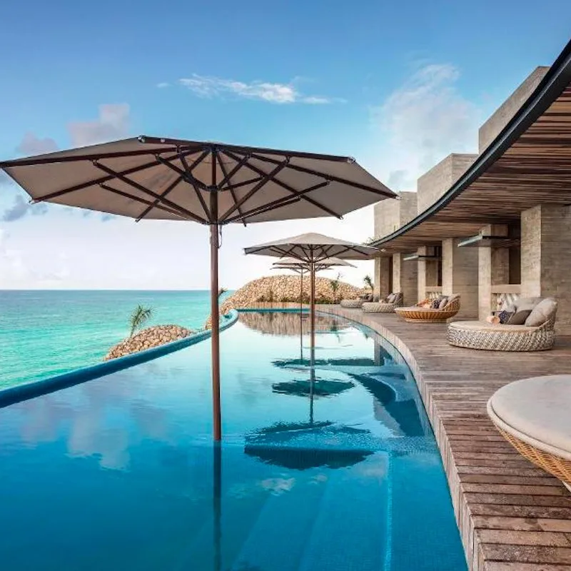 view of la casa de la playa by xcaret's swim up pool during the day