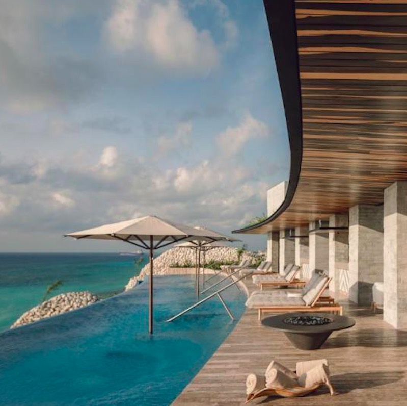infinity pool at La Casa de la Playa by XCaret, view during the day.