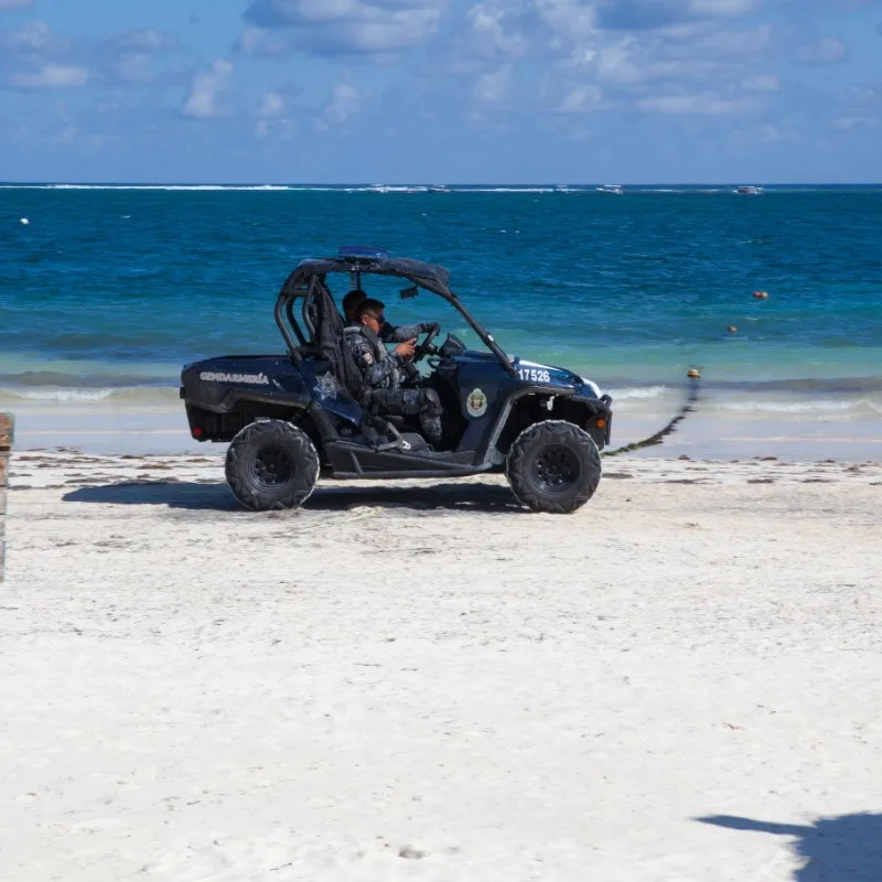 Police Patrolling Beach