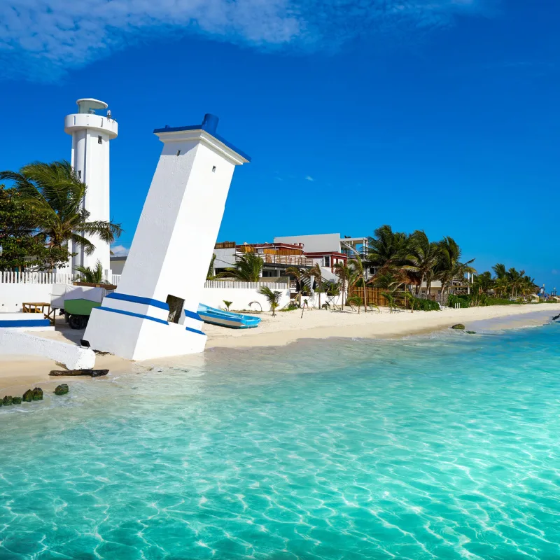 Puerto Morelos beach view with shops and boats