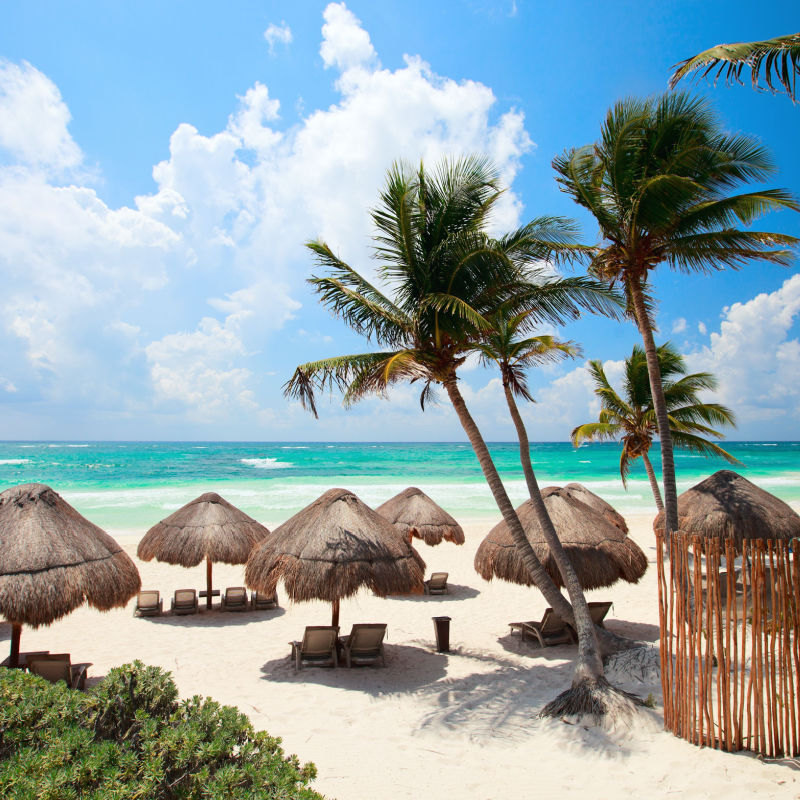 Sunny tropical view of Tulum resort beach