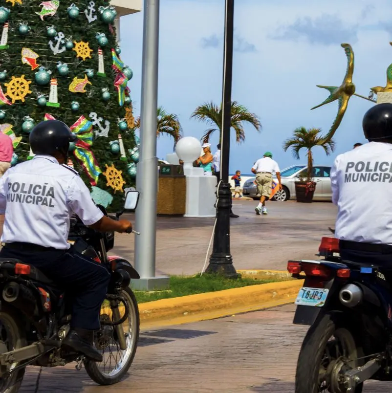 Police riding motorcycles during the peak season in Cancun
