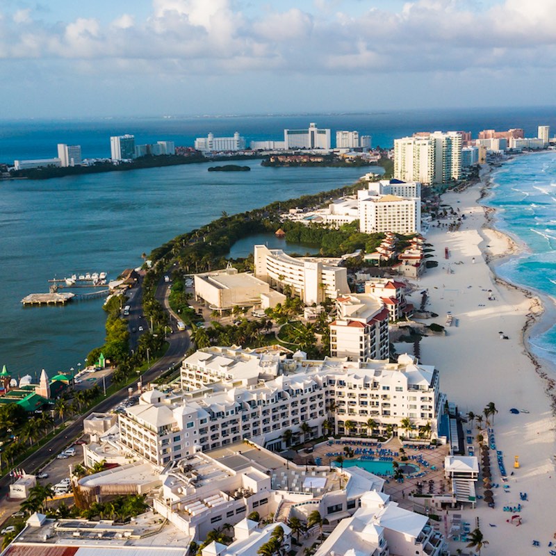 Aerial Drone View of Zona Hotelera in Cancun, Mexico during the day.
