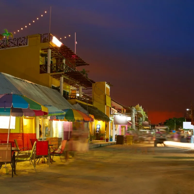 Holbox at Night with restaurants lit up.