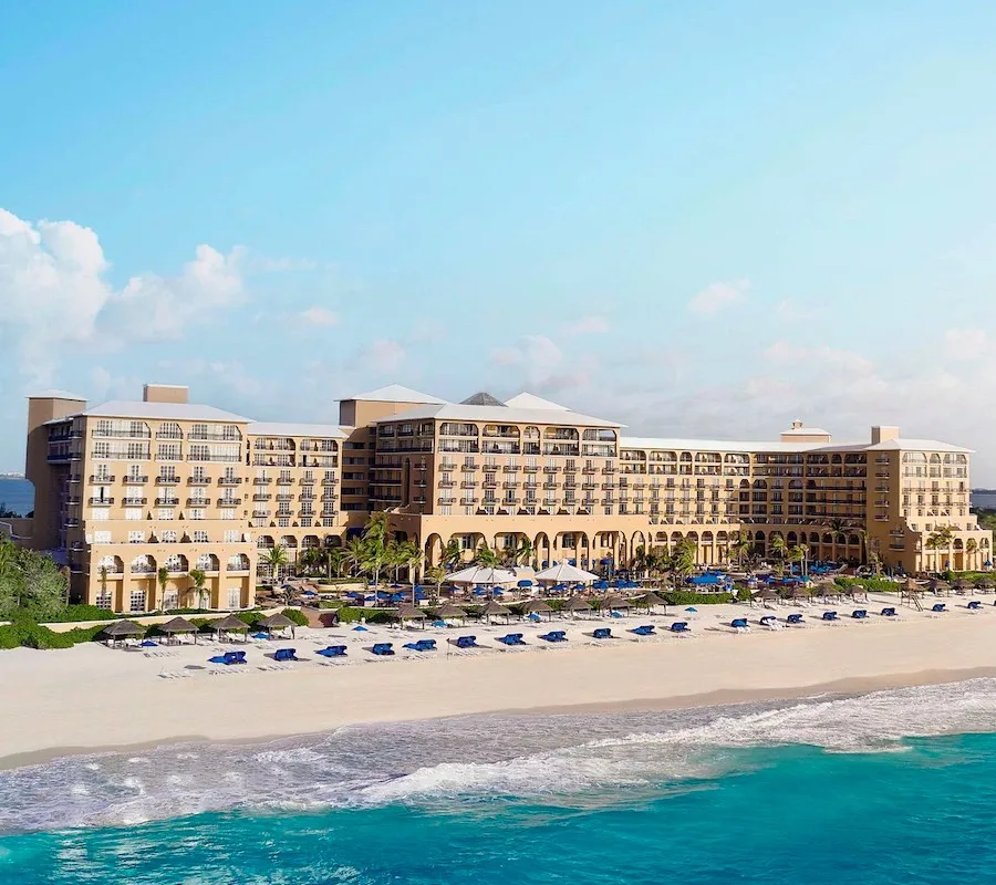 exterior view of the Kempinski Hotel Cancun, beach and ocean