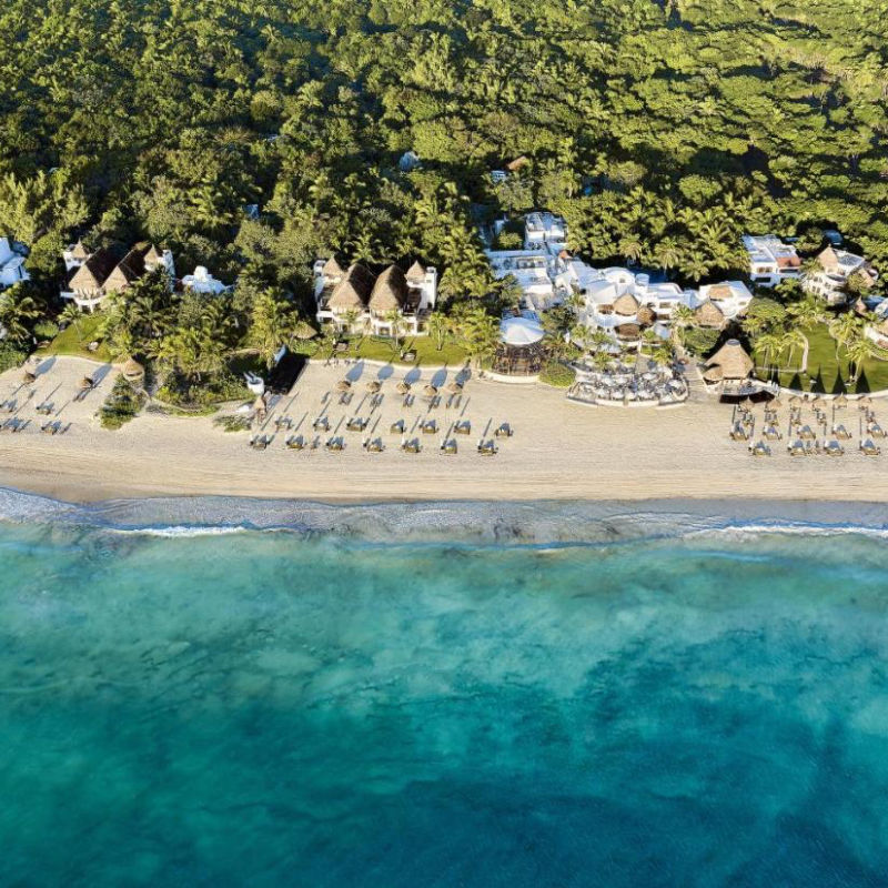 Aerial view of the Maroma hotel with sea and beach
