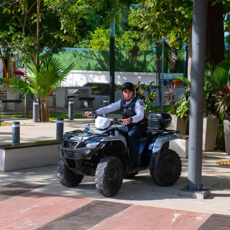 Police Patrolling Downtown Cancun on an ATV.