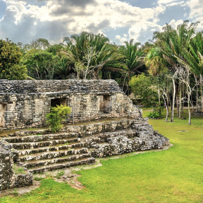 tourist location of ruins of the ancient Mayan city of Kohunlich in bacalar mexico on a sunny day surrounded by beautiful trees