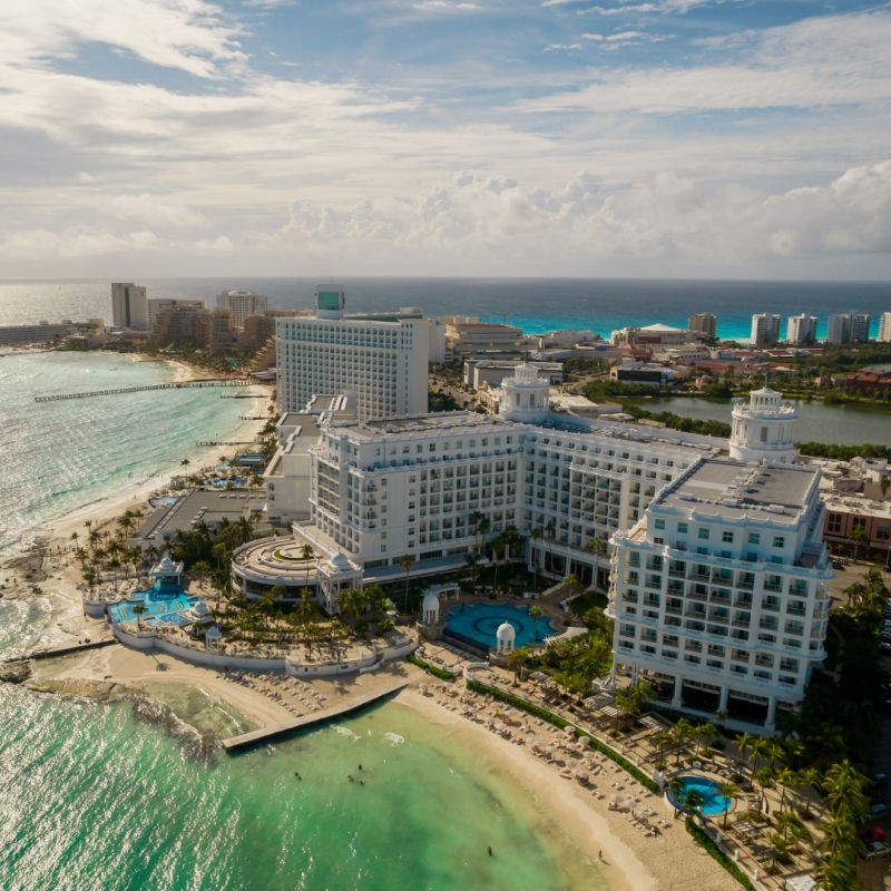Cancun Hotel Zone lined with luxury resorts and surrounded by the Caribbean Sea.