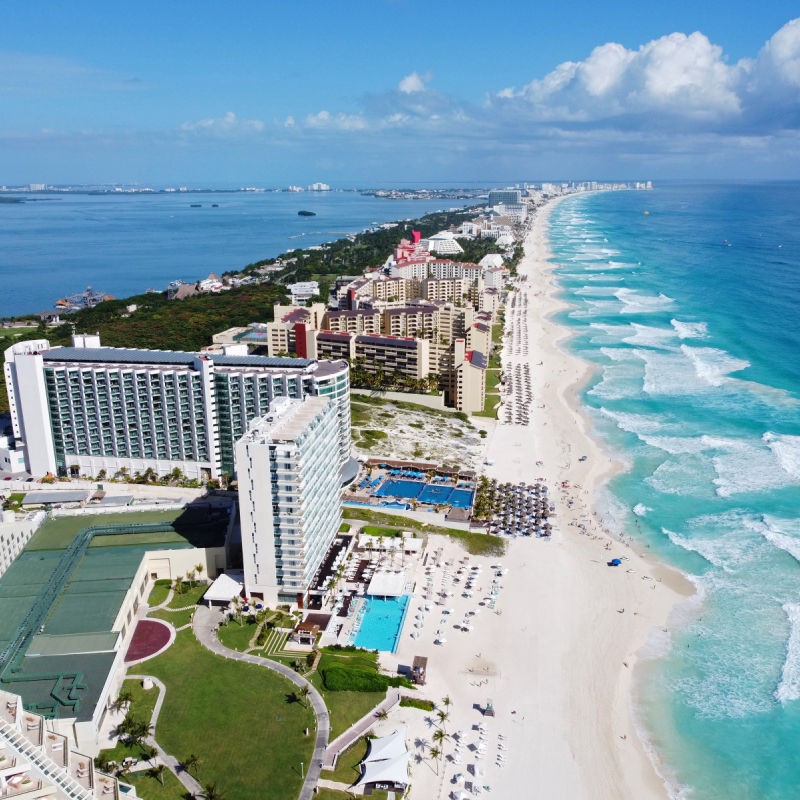 Cancun Hotel Zone with resorts and sandy beaches by the Caribbean Sea.