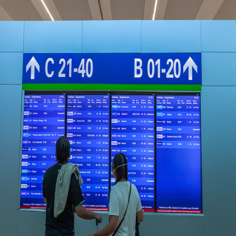 Departure Board at Cancun Airport