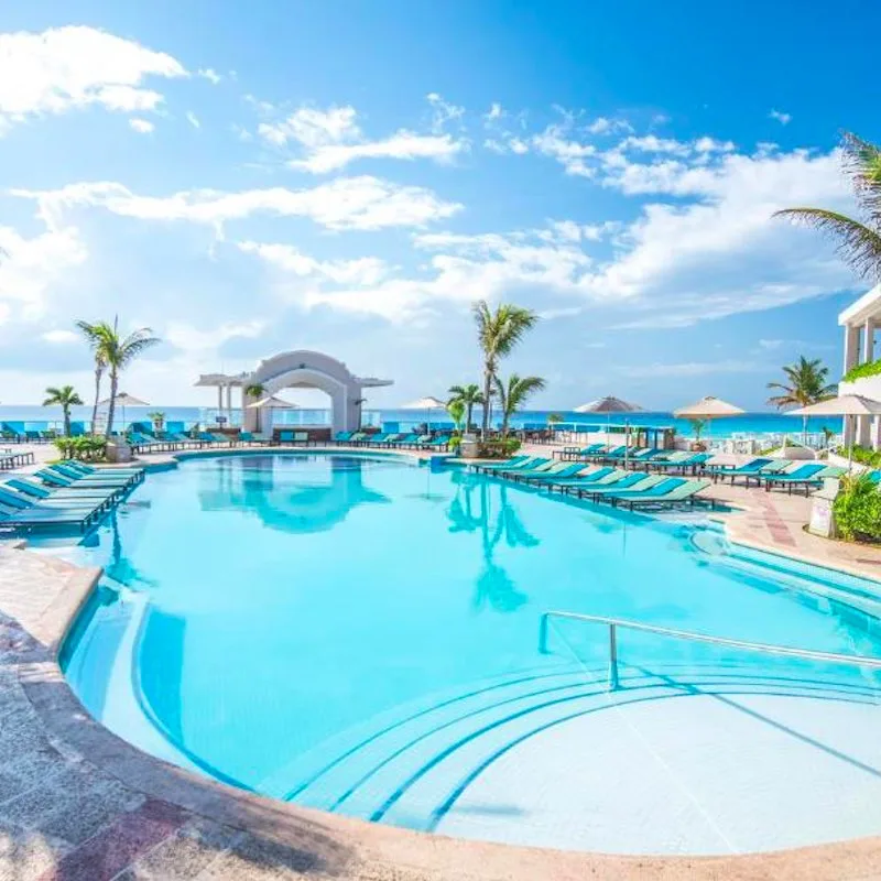 pool during the day at the Wyndham Alltra Cancun All-Inclusive Resort.