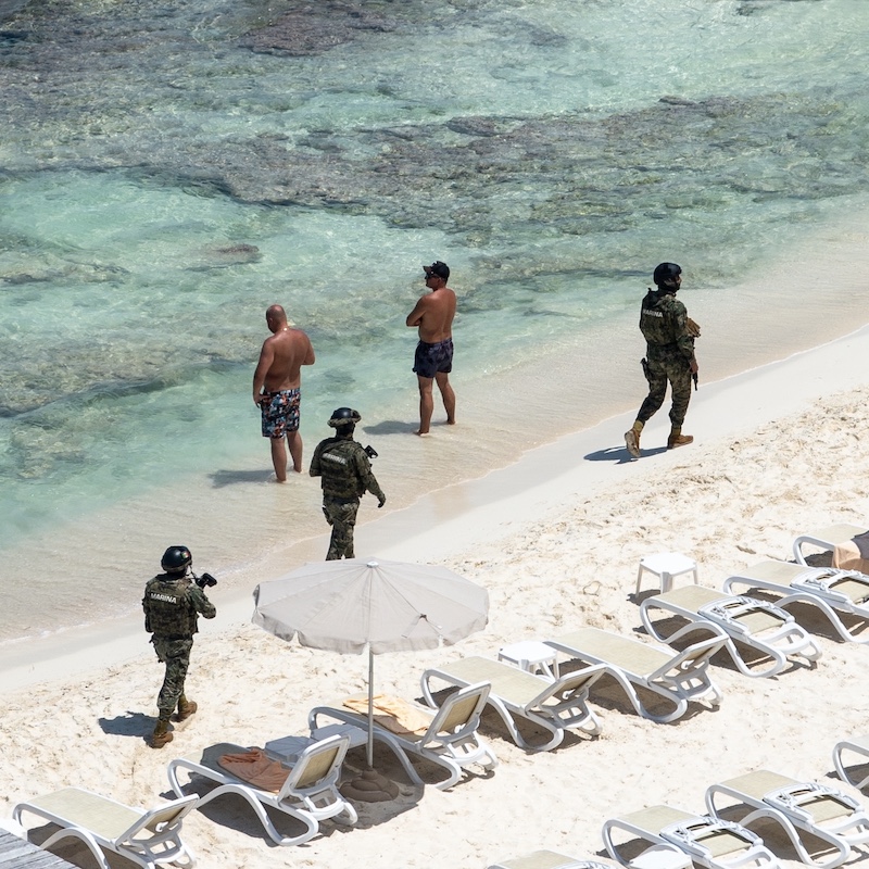 battle on the beach in Cancun