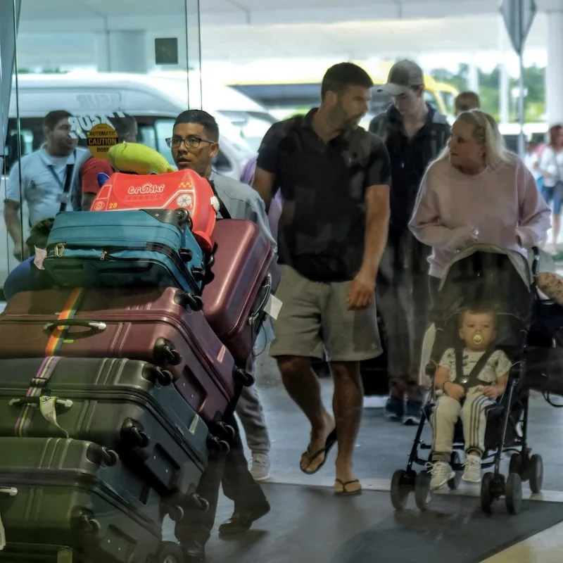 travelers luggage cancun airport