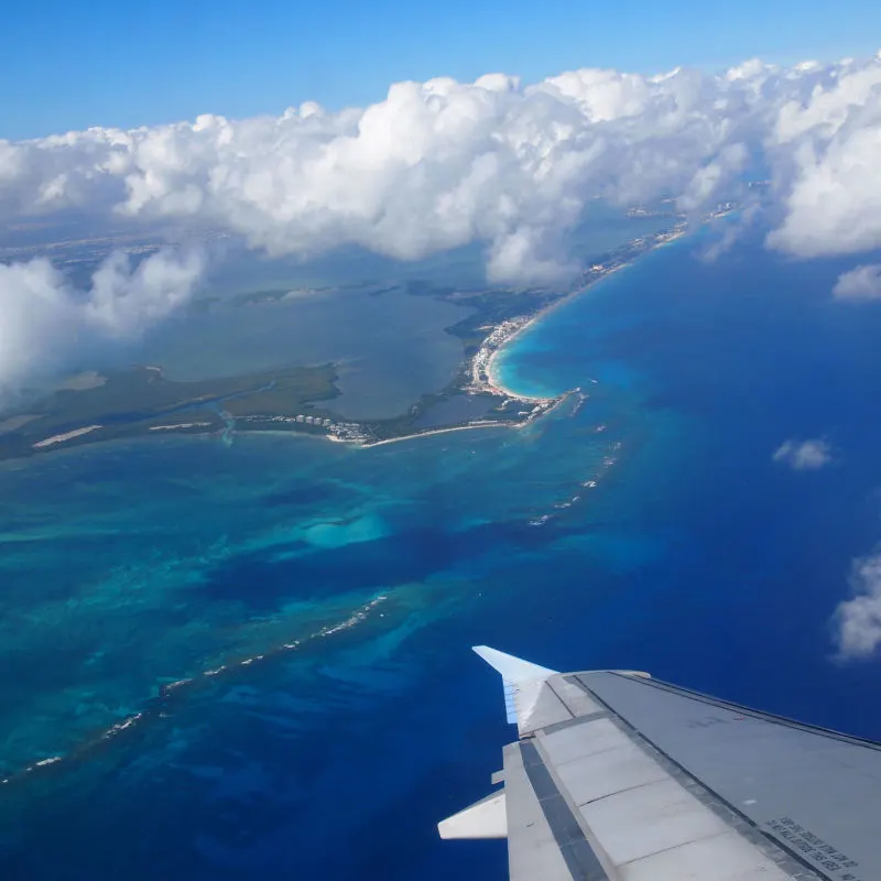 An aircraft on approach to Cancun