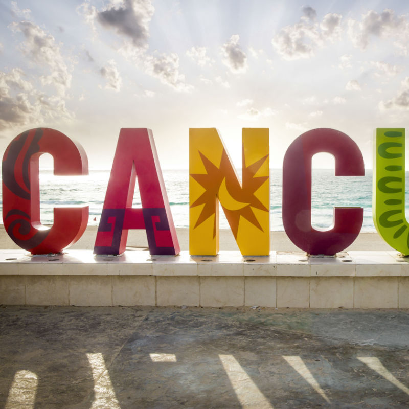 colorful Cancun city sign during the day.