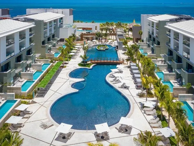 Pool and buildings at the Catalonia Grand Costa Mujeres resort.