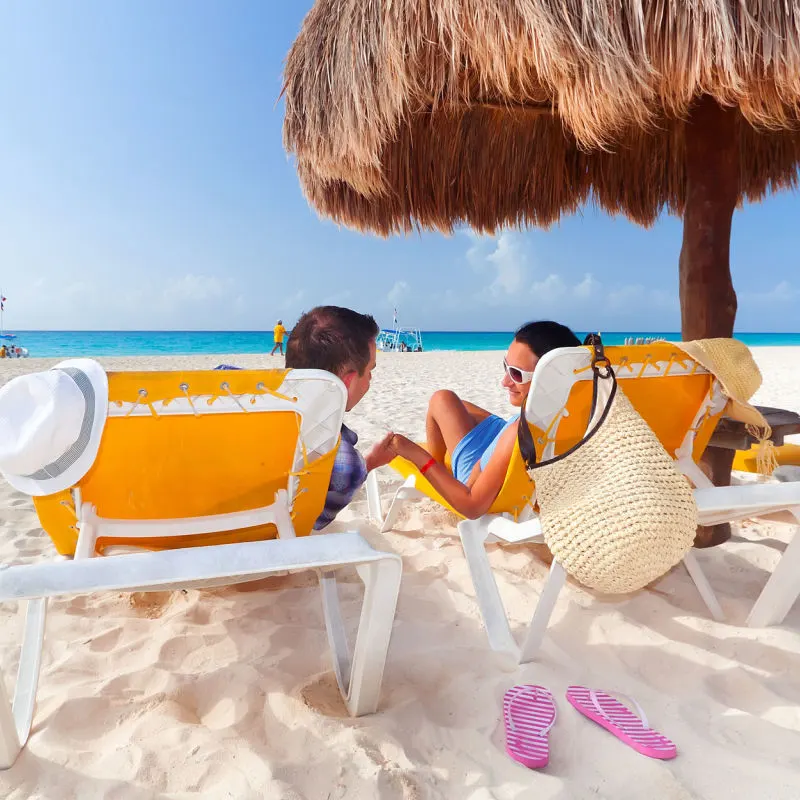 A beautiful beach with a young couple 