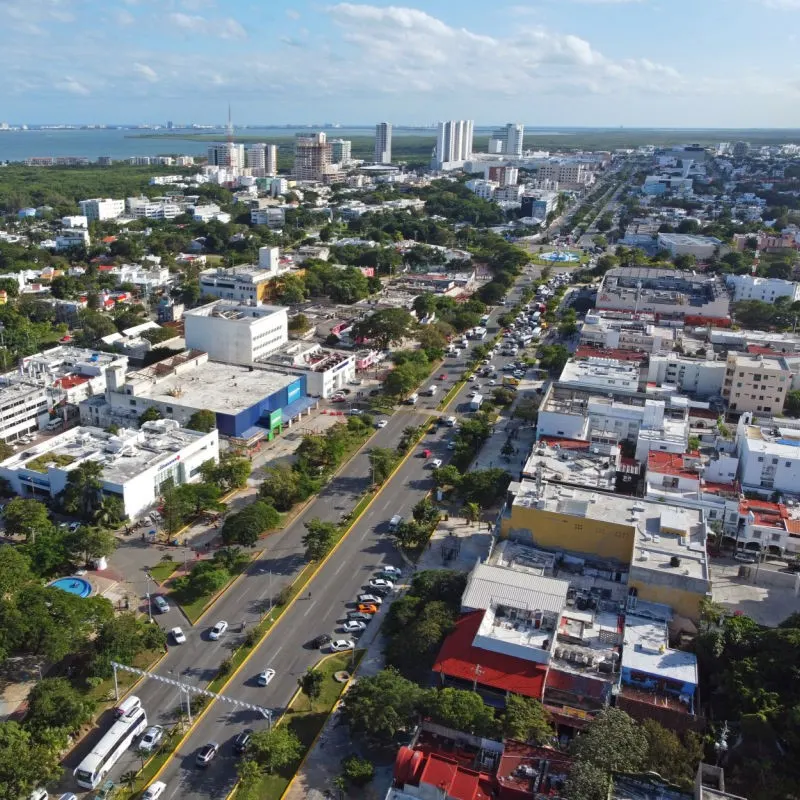 Downtown Cancun with Streets Filled with Cars and Green Trees Everywhere