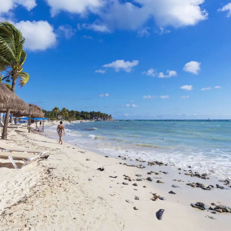 View of a popular beach in Playa del Carmen with warm tropical weather
