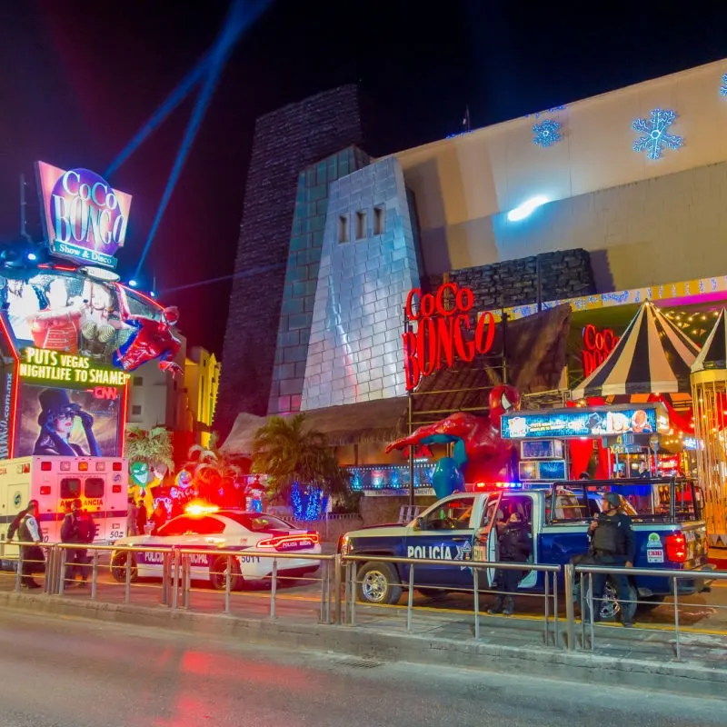 Police Vehicles on the Street in Cancun in Front of Coco Bongo