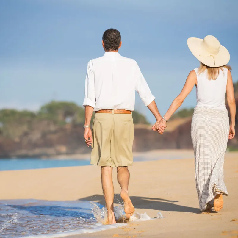 Elderly couple enjoying the sun and beach in Cancun