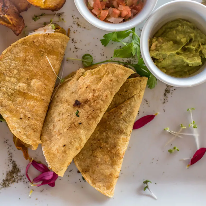 A plate of homemade tacos in a Mexican restaurant