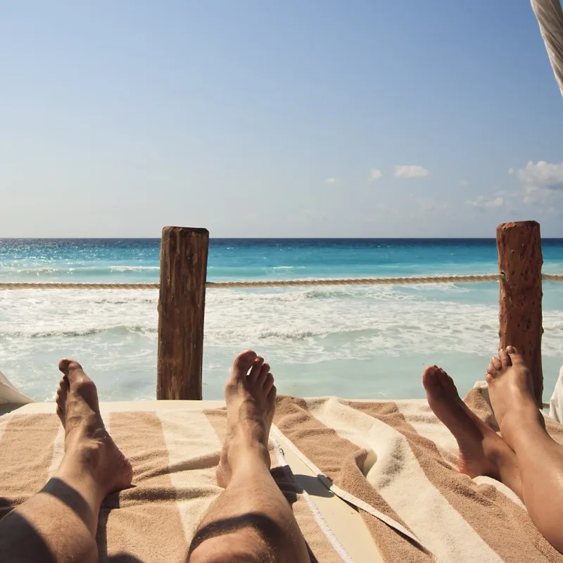 Tourists relaxing on a cancun beach