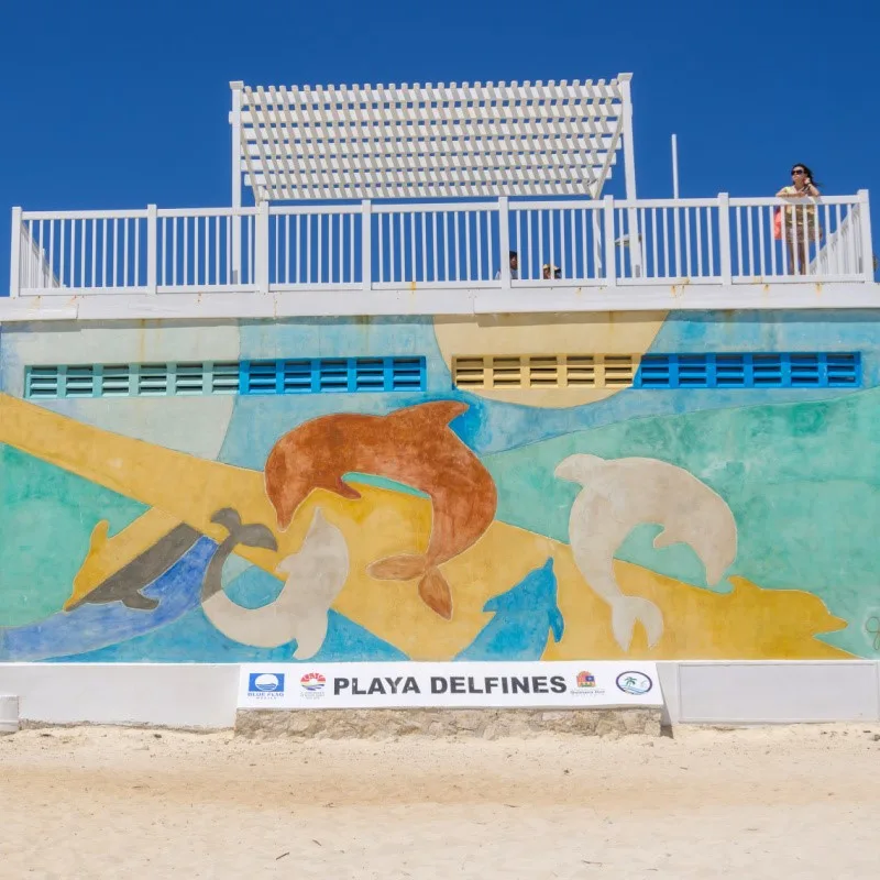 Woman Looking Out at Playa Delfines in Cancun, Mexico