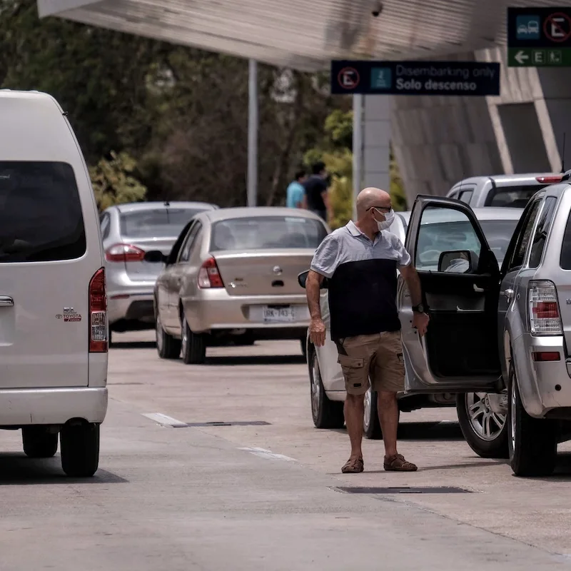 cancun airport drop off busy