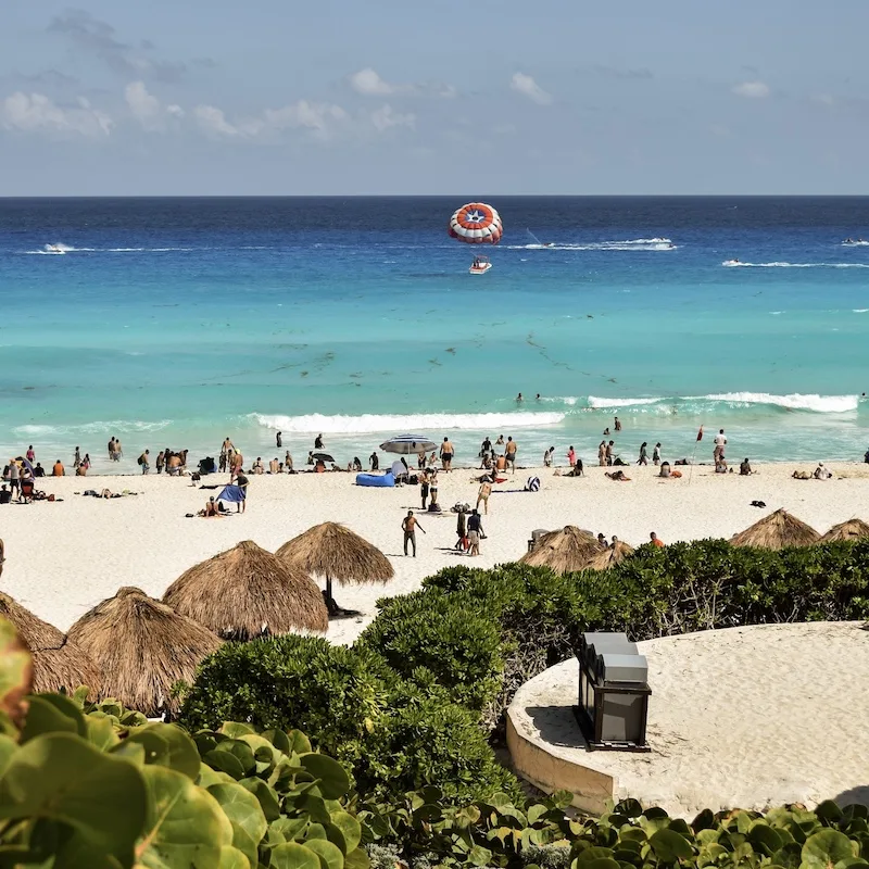 Cancun Playa Delfines beach on a busy day.