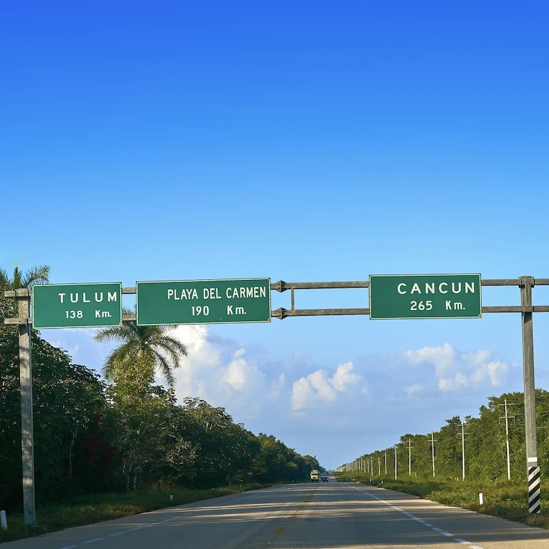 empty highway road sign tulum cancun