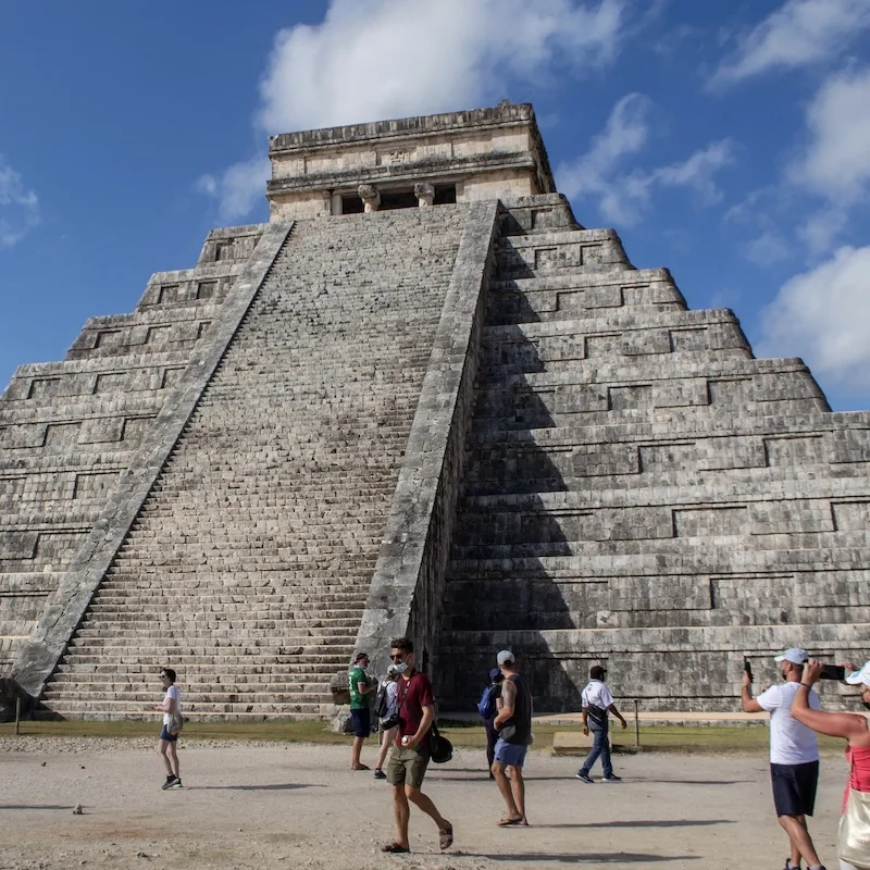 traveelrs at chichen itza temple