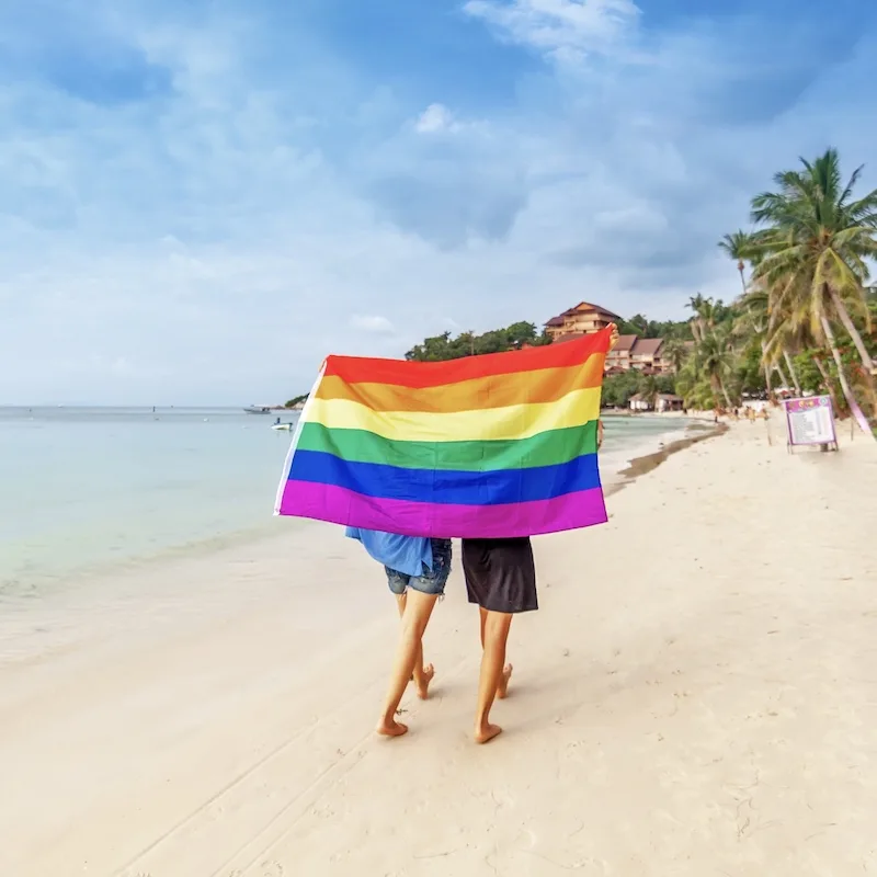 travelers pride flag rainbow beach