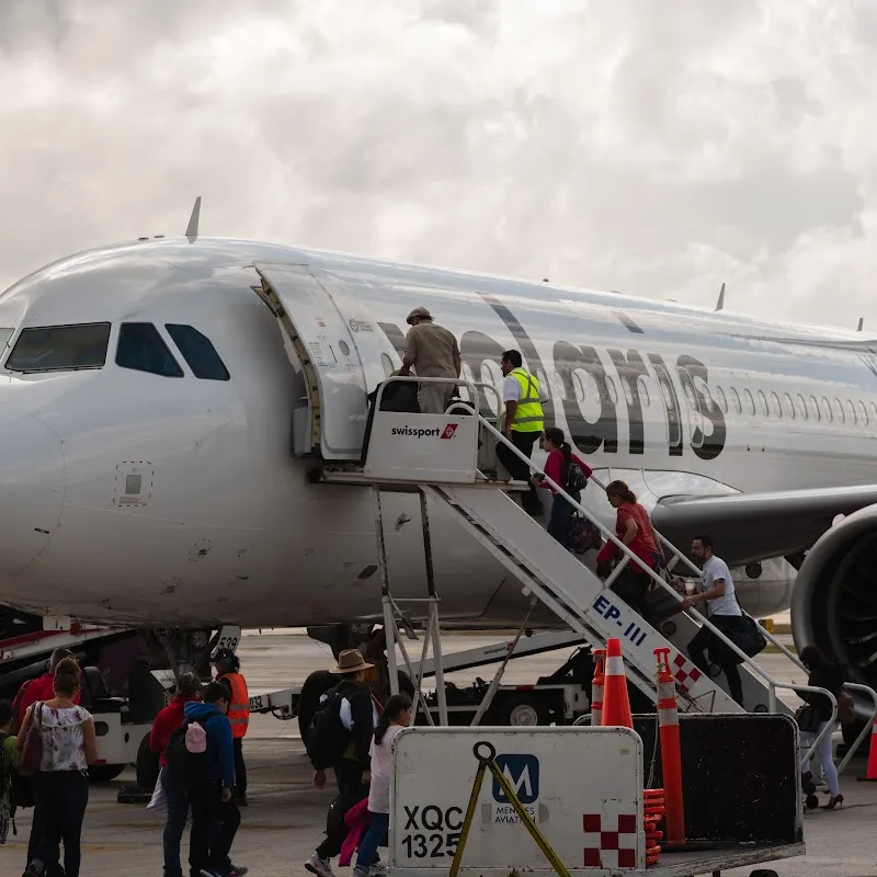 Passengers boarding a Volaris flight