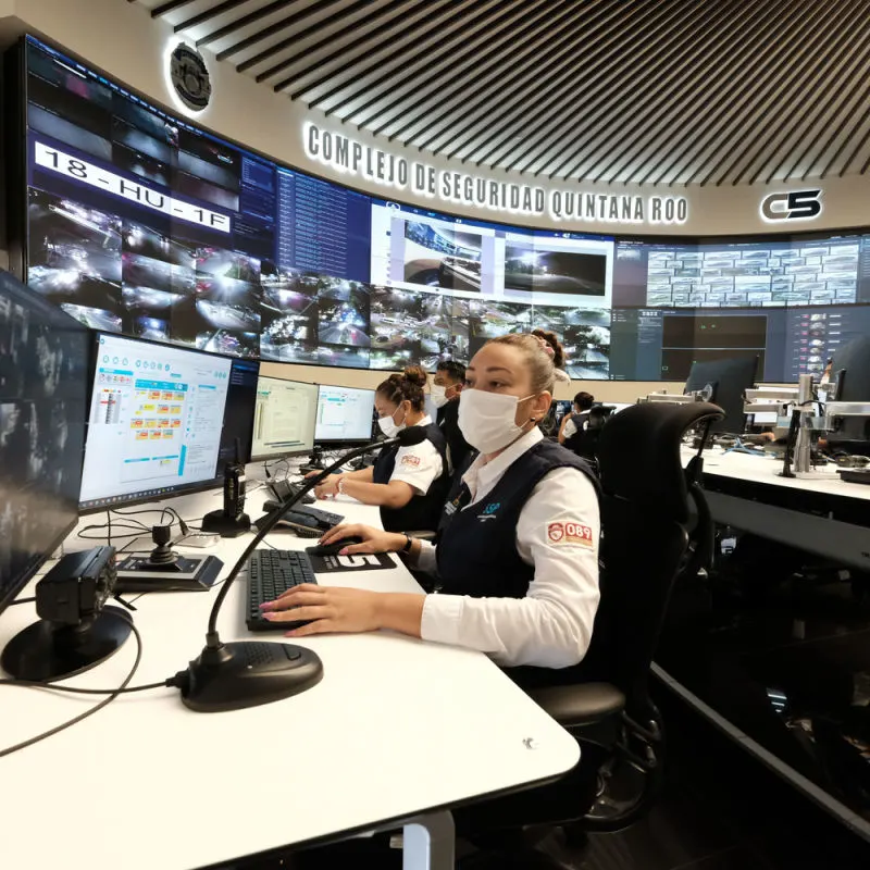 Police centre in Cancun with a female agent assisting travellers